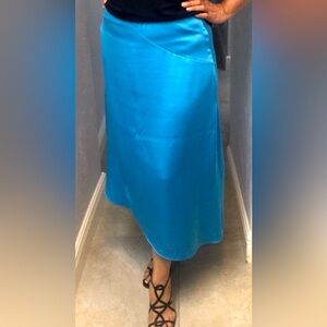 Alfani satin like blue skirt, size 14.